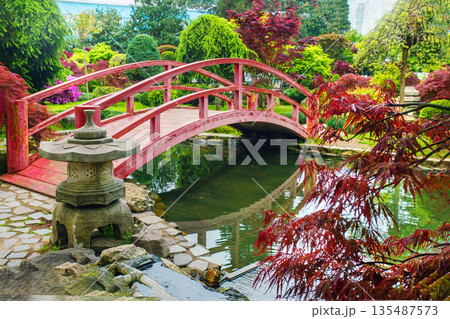 Red footbridge in Japanese garden in Batumi 135487573