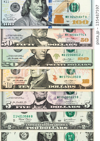 US banknotes background with different denominations in horizontal rows 135487597