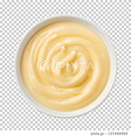 Creamy Sauce in a Round White Bowl on a Plain Surface Ready for Serving With Food 135488460