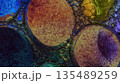A colorful background with many small drops of water. 135489259