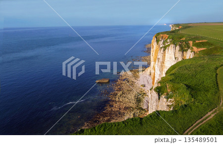 Steep cliffes omn Normandian coast of France 135489501