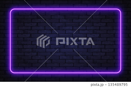 Vibrant purple neon frame glowing on a dark brick wall. The stylish contrast gives a modern, nightlife-inspired atmosphere perfect for ads and digital projects. 135489795