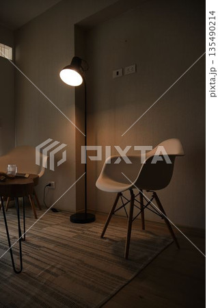 Cozy living room creating relaxing mood with warm lighting 135490214