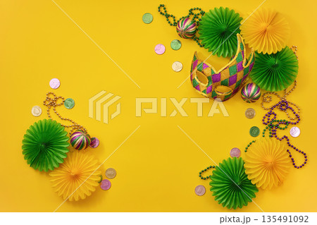 Mardi gras mask beads coins festive carnival celebration Mardi gras mask beads coins festive carnival celebration 135491092