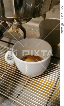 Freshly Brewed Espresso in a White Coffee Cup Freshly Brewed Espresso in a White Coffee Cup 135491220
