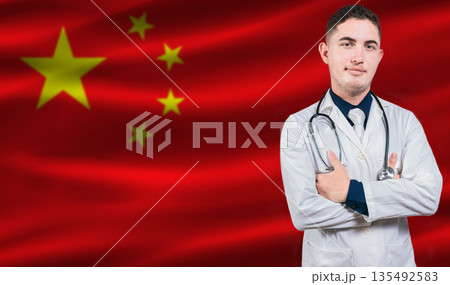Portrait of medical professional on China flag background. Chinese national health system Portrait of medical professional on China flag background. Chinese national health system 135492583