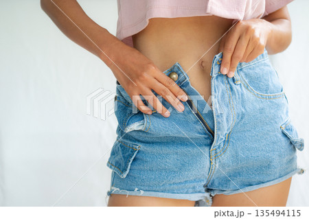 Slim Fit Body Woman Close up, Shapely Beauty Perfect non Fat and Cellulite, Thin Young Healthy from Diet Gym Exercise Massage Treament and Control Weige Health Care Lifestyle, Skin Tan Model Female. Slim Fit Body Woman Close up, Shapely Beauty Perfect non Fat and Cellulite, Thin Young Healthy from Diet Gym Exercise Massage Treament and Control Weige Health Care Lifestyle, Skin Tan Model Female. 135494115