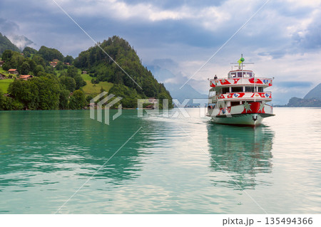 Lake Brienz and historic building in Iseltwald Switzerland Lake Brienz and historic building in Iseltwald Switzerland 135494366