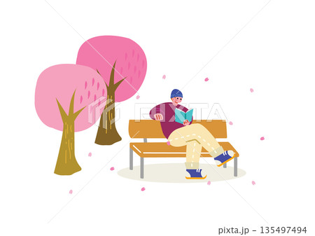 桜の木下で本を読む男性 135497494