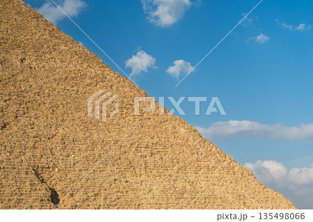 Majestic Great Pyramid of Giza, Egypt Ancient Wonder Against a Stunning Blue Sky, Travel Majestic Great Pyramid of Giza, Egypt Ancient Wonder Against a Stunning Blue Sky, Travel 135498066