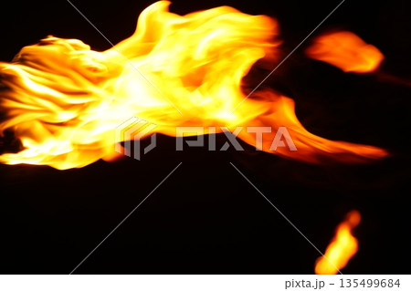 Glowing Fire Torch in the Night Glowing Fire Torch in the Night 135499684