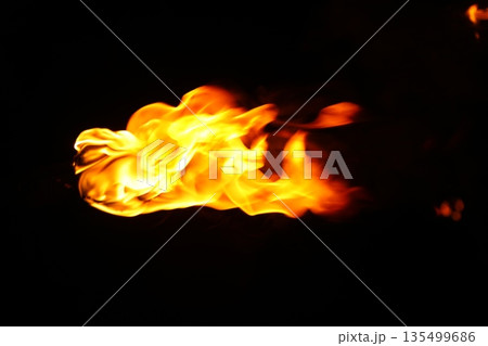 Glowing Fire Torch in the Night Glowing Fire Torch in the Night 135499686