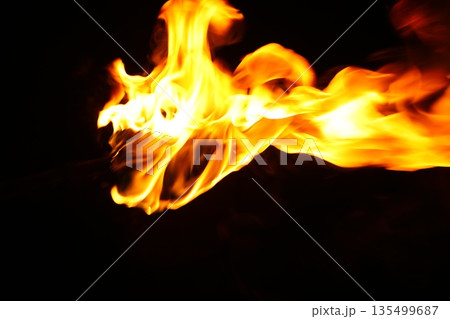 Glowing Fire Torch in the Night 135499687