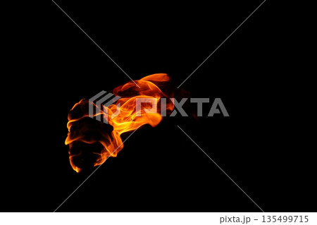 Glowing Fire Torch in the Night Glowing Fire Torch in the Night 135499715