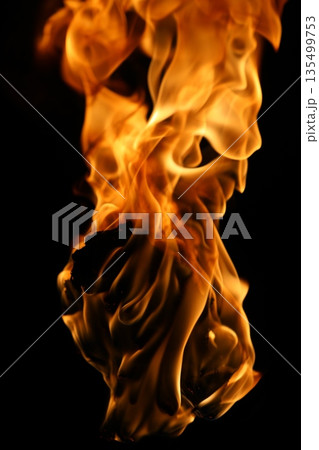 Glowing Fire Torch in the Night 135499753