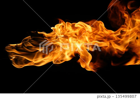 Glowing Fire Torch in the Night Glowing Fire Torch in the Night 135499807
