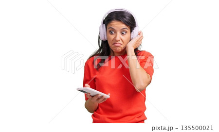 Young woman reacting to music he doesn't like transparent background 135500021
