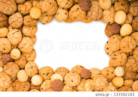 Cookies frame background isolated on white. Oatmeal, chocolated drops biscuits and other sweets border Cookies frame background isolated on white. Oatmeal, chocolated drops biscuits and other sweets border 135502183