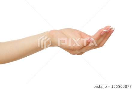 Female hand keeping empty cupped palm, close-up, cutout, isolated on white background. Offering or begging concept. 135503877