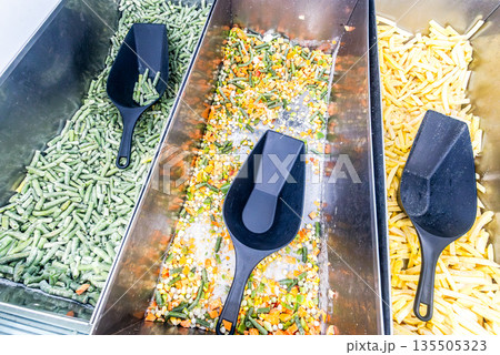 Frozen vegetables are sold at the grocery store. A good natural product for fast cooking delicious food Frozen vegetables are sold at the grocery store. A good natural product for fast cooking delicious food 135505323