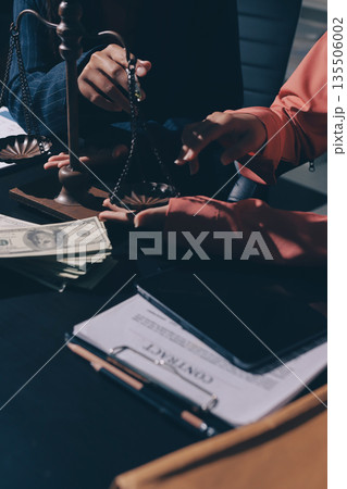 Consultation and conference of professional businesswoman and Male lawyers working and discussion having at law firm in office. Concepts of law, Judge gavel with scales of justice 135506002