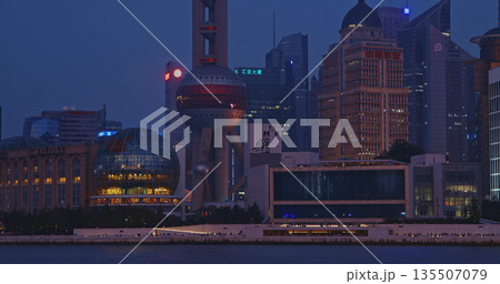 Iconic Shanghai Landmarks Captured During Evening Glow with City Lights Shining 135507079