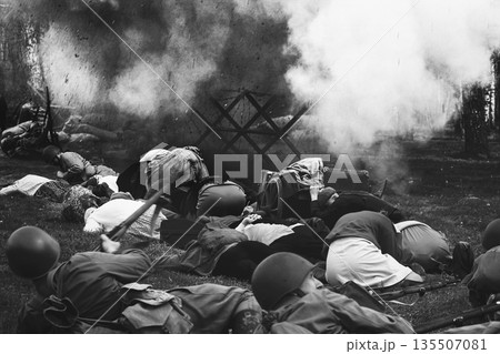 Soviet Russian Nkvd Forces Escort Civilians Under air attack. Soviet Soldiers Uniform. Evacuation Of Civilians. Black And White 135507081