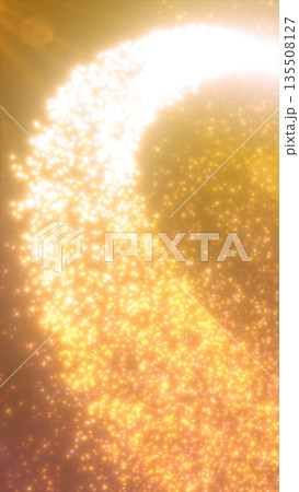 Brilliant golden particle stream bursting with warm sparkles and radiant glowing light Brilliant golden particle stream bursting with warm sparkles and radiant glowing light 135508127