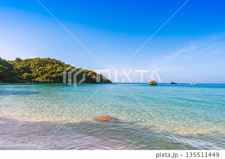 Beautiful panoramic view of the turquoise sea and lush green hills at Ao Prao, Koh Samed, Rayong, Thailand Beautiful panoramic view of the turquoise sea and lush green hills at Ao Prao, Koh Samed, Rayong, Thailand 135511449