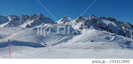 Ski lift in the Pizol ski area, snow covered mountains Graue Hoerner and Schwarze Hoerner, Switzerland. Ski lift in the Pizol ski area, snow covered mountains Graue Hoerner and Schwarze Hoerner, Switzerland. 135511940