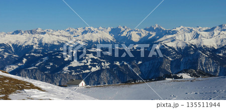 Snow covered mountains of Graubuenden Canton, view from the Pizol ski area, Switzerland. Snow covered mountains of Graubuenden Canton, view from the Pizol ski area, Switzerland. 135511944