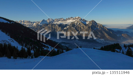 Mount Alvier at sunset, view from the Pizol ski area, Switzerland. 135511946