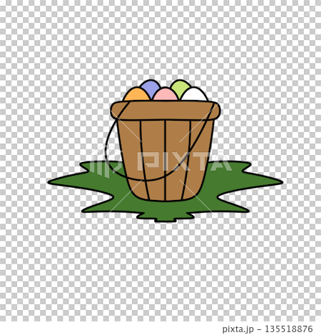 A basket of eggs is sitting on the grass 135518876