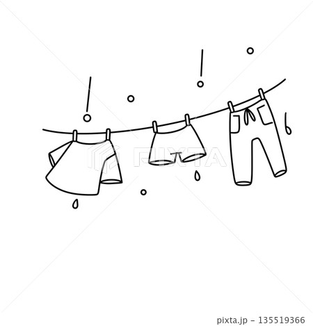 A line of clothes hanging on a clothesline 135519366