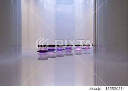 Biotech Incubator Shows Glowing Cultures in Transparent Container at Modern Lab 135520284
