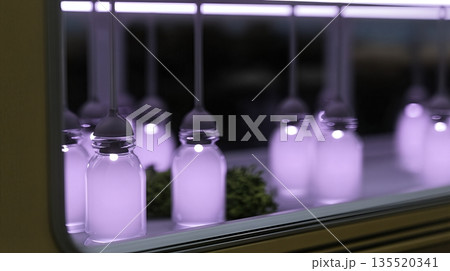 Nutrient Testing Setup With Glowing Bottles in a Lab Environment at Nighttime 135520341