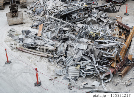 Aluminum industry extrusion at building construction site. Aluminum building system. Aluminum extrusion profile. Construction site storage with aluminum tubes. Steel extrusion. Industry material Aluminum industry extrusion at building construction site. Aluminum building system. Aluminum extrusion profile. Construction site storage with aluminum tubes. Steel extrusion. Industry material 135521217