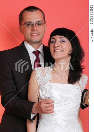 Happy smiling bride and groom Happy smiling bride and groom 135523842