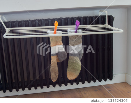 Handmade warm wool socks in clothes line Handmade warm wool socks in clothes line 135524305