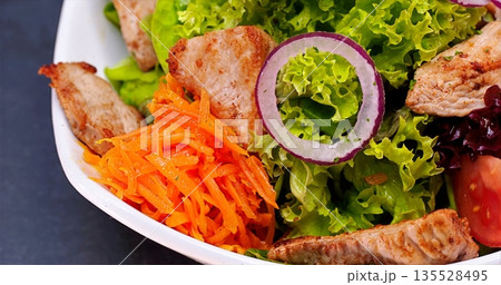 Appetizing Healthy Salad Featuring Grilled Chicken And Crisp Vegetables Illuminated By Bright Natural Light Appetizing Healthy Salad Featuring Grilled Chicken And Crisp Vegetables Illuminated By Bright Natural Light 135528495