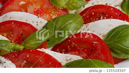 Colorful Sliced Tomato Cheese Basil Dish, Bright Tomato Fresh Mozzarella With Basil And Olive Oil 135528507