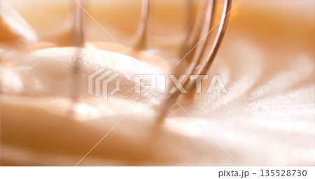Cream Peaks Formed, Fastmotion Shot Capturing Glossy Foam Of Whipped Cream Forming Around Beaters 135528730