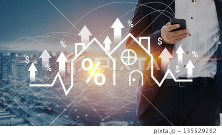 Businessman Holding Smartphone with Real Estate Growth Graph and House Icons in Background, Symbolizing Market Trends and Housing Finance Gluon Businessman Holding Smartphone with Real Estate Growth Graph and House Icons in Background, Symbolizing Market Trends and Housing Finance Gluon 135529282