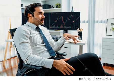 Trader analyzing in dynamic stock exchange investment screen on pc. Surmise. Trader analyzing in dynamic stock exchange investment screen on pc. Surmise. 135529703