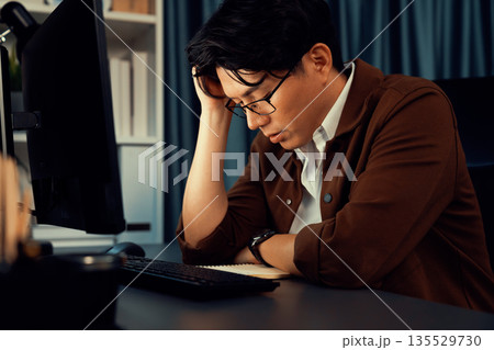 Businessman with stress working pc waiting email from customer. Infobahn. Businessman with stress working pc waiting email from customer. Infobahn. 135529730