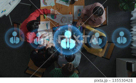 Collaborative Team Brainstorming Session with Visual Data and Creative Ideas in Modern Workplace Environment. Raster Collaborative Team Brainstorming Session with Visual Data and Creative Ideas in Modern Workplace Environment. Raster 135530428
