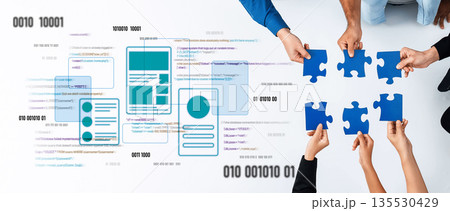 Collaborative Teamwork with Puzzle Pieces and Digital Elements Representing Problem Solving and Innovation in Modern Work Environments Trope 135530429