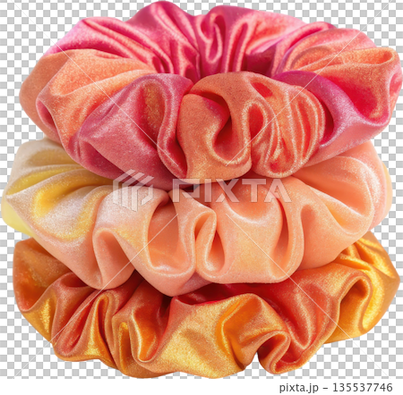 Stack of shiny velvet scrunchies in gradient colors 135537746