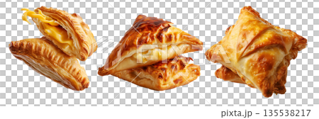 Flaky filled puff pastries pocket with melted cheese oozing out, isolated on white background, concept of Brazil snack 135538217