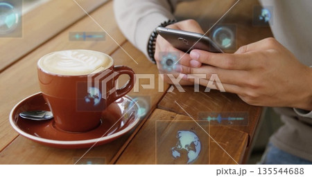 Man wearing tan sweater gripping phone at cafe table, with latte cup, floating icons, copy space Man wearing tan sweater gripping phone at cafe table, with latte cup, floating icons, copy space 135544688